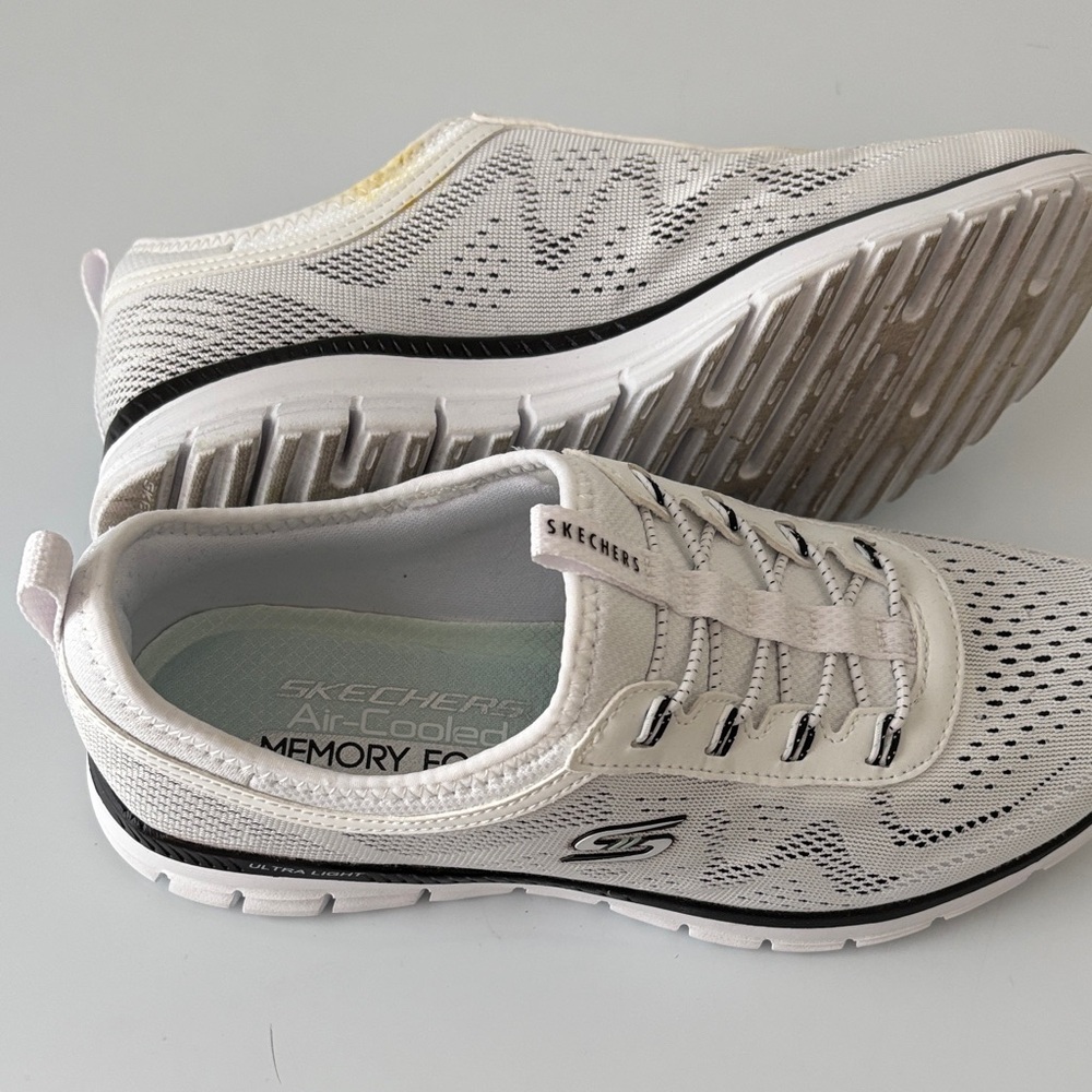 Skechers Women's Cream and Black slip-on Sneakers